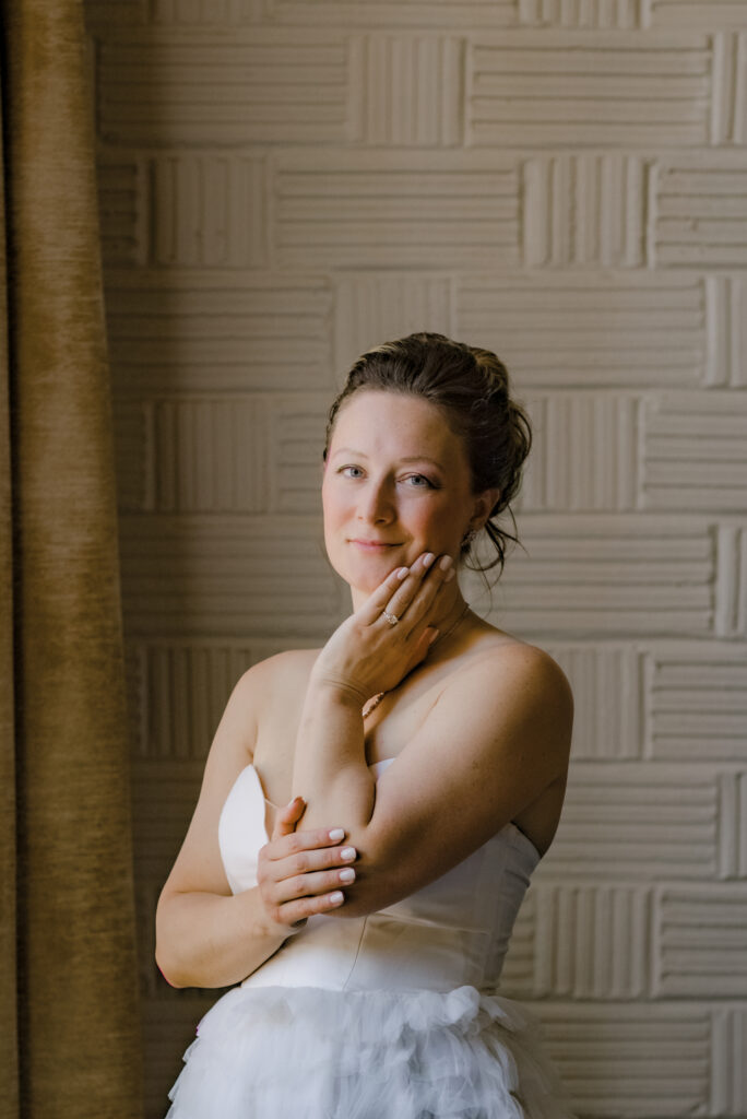 bride portrait getting ready photos with her wedding dress